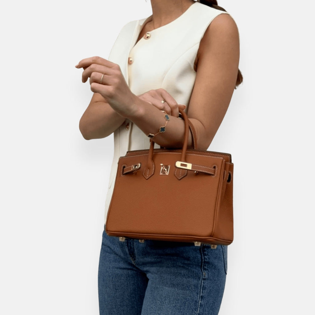 Sofia | Mala clássica com fecho elegante e atemporal.