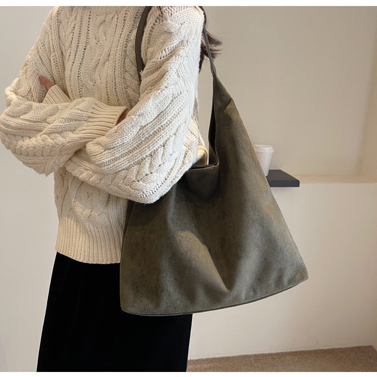 Lúcia™ | Saco em camurça elegante e sofisticado.