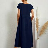 Inês — Vestido midi fluido de elegância intemporal
