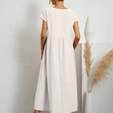 Inês — Vestido midi fluido de elegância intemporal
