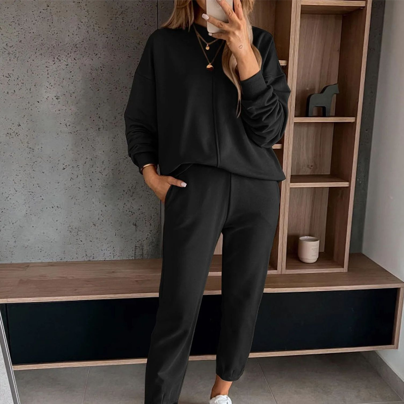 Clara | Conjunto de duas peças confortável para mulher, composto por um sweatshirt e umas calças de jogging.